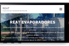 Site da Reat em um celular deitado Site da Reat em um celular deitado
