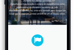 Site da Reat em um celular em pé Site da Reat em um celular em pé
