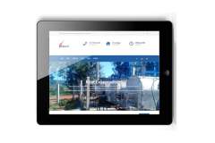 Site novo da Reat em um tablet deitado. Site novo da Reat em um tablet deitado.